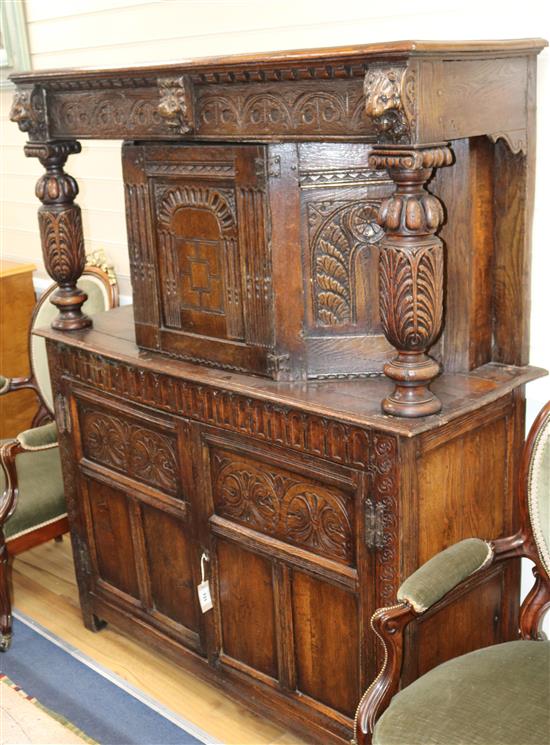 A 17th century style oak court cupboard, W.4ft 3in. D.1ft 7in. H.5ft 3in.